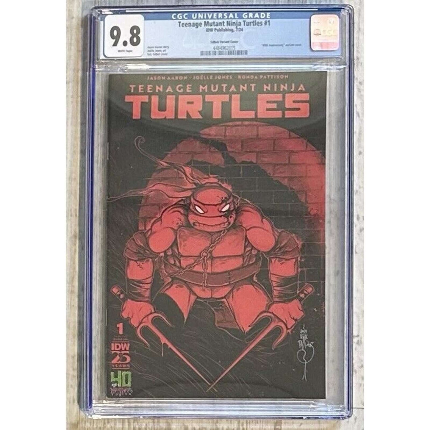 Teenage Mutant Ninja Turtles # 2024 Cover N - Talbot 40th Anniversary CGC 9.8 This is a rare and highly collectible Teenage Mutant Ninja Turtles comic book featuring cover artist Rafael Albuquerque and writers Dave Wachter, Joëlle Jones, and Jason Aaron.